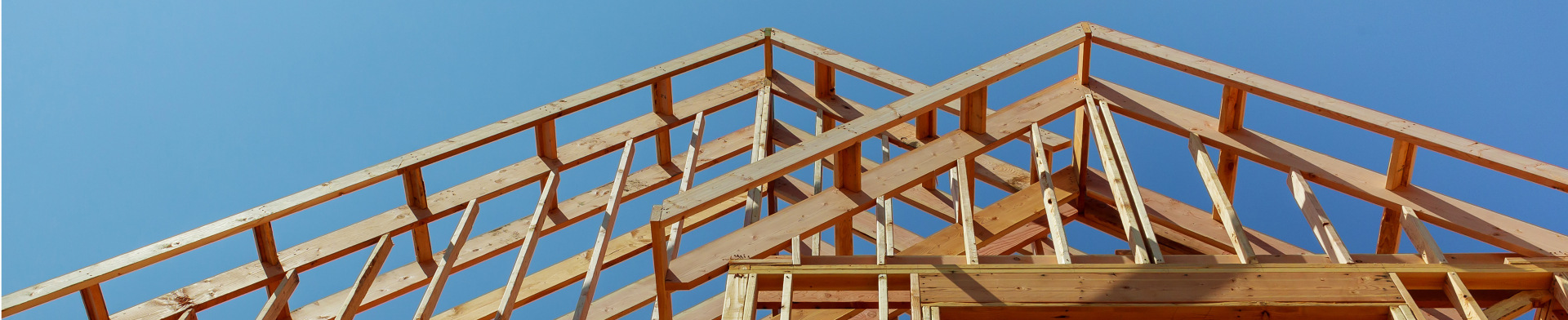 A wooden frame of a building.