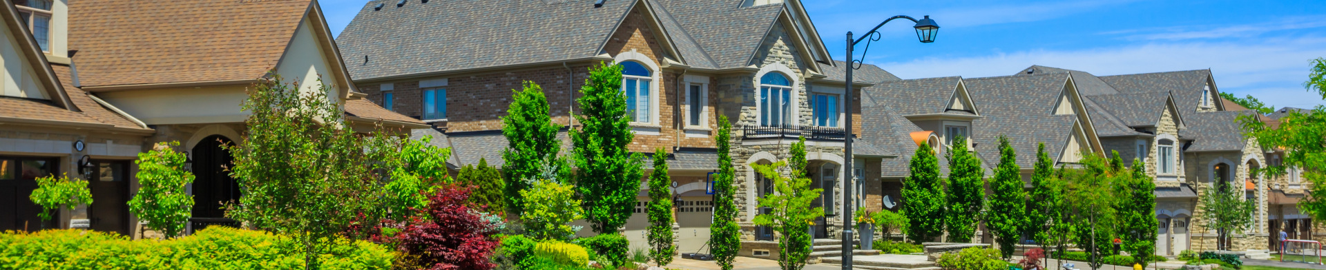 A street of a fancy, high end neighborhood.