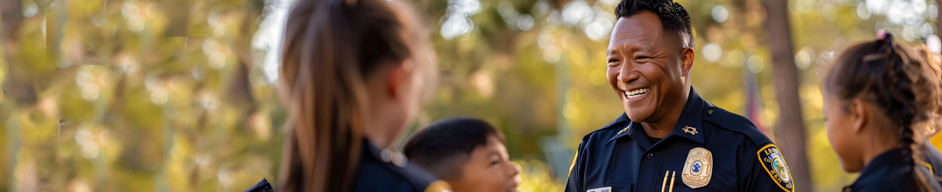 Smiling policeman with children 